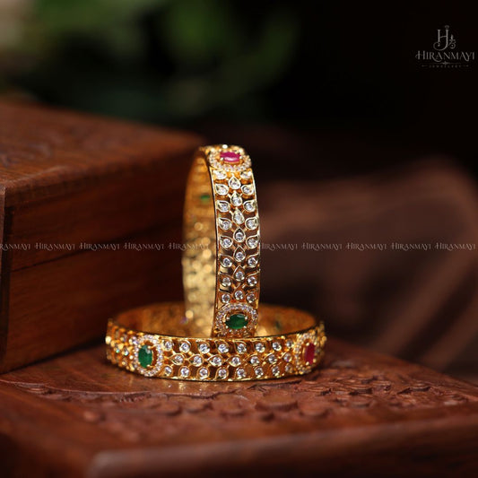 6 Ad stone with ruby and emerald studded bangles
