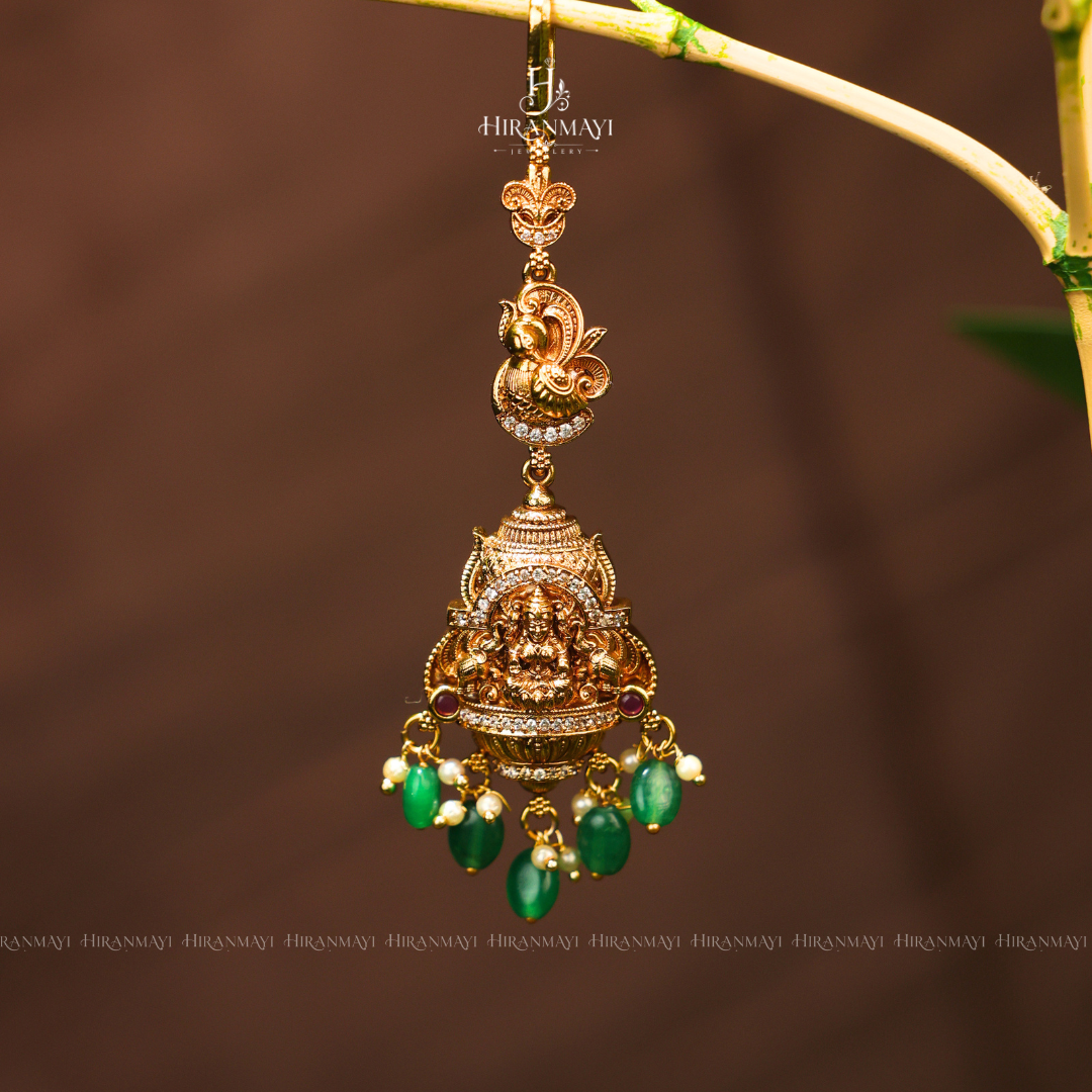Antique Lakshmi with peacock tikka