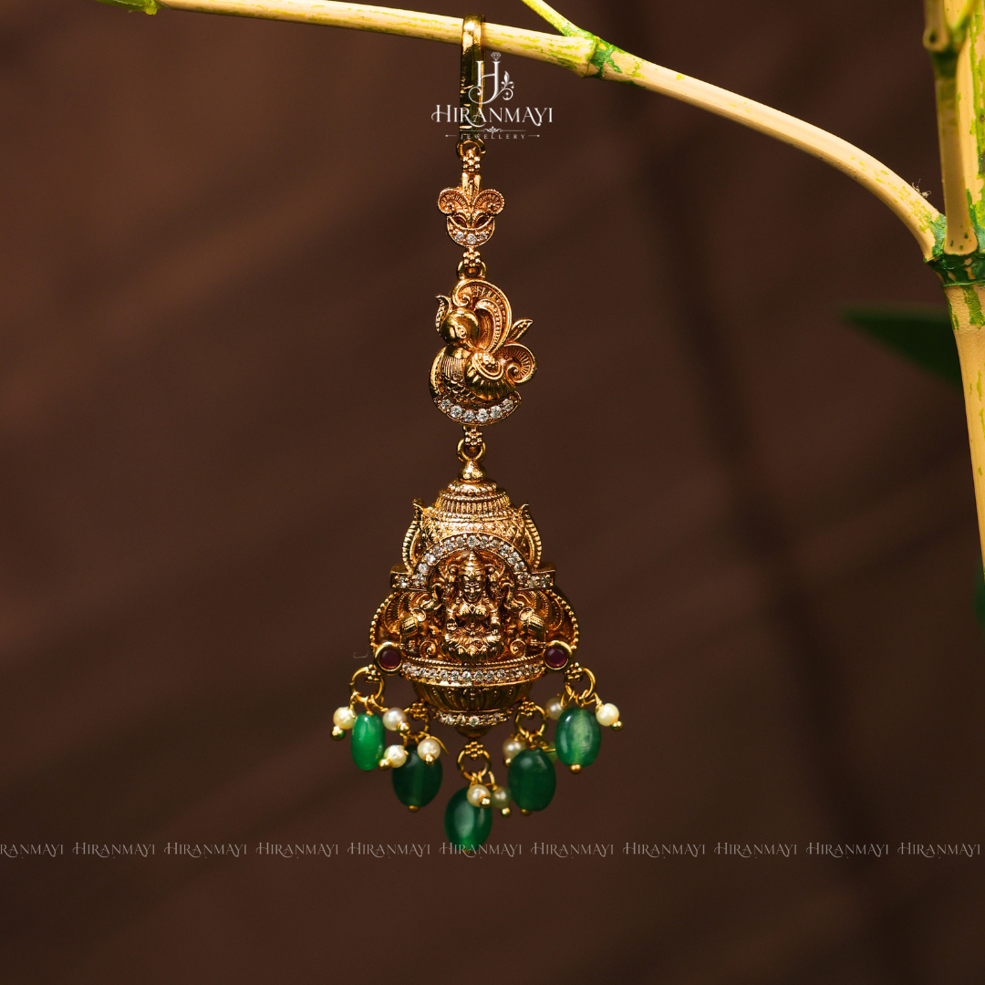 Antique Lakshmi with peacock tikka