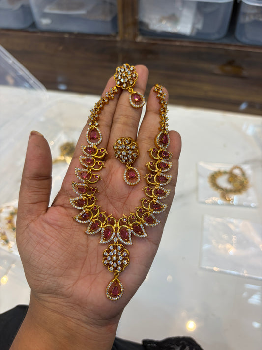 Peacock design necklace with earrings