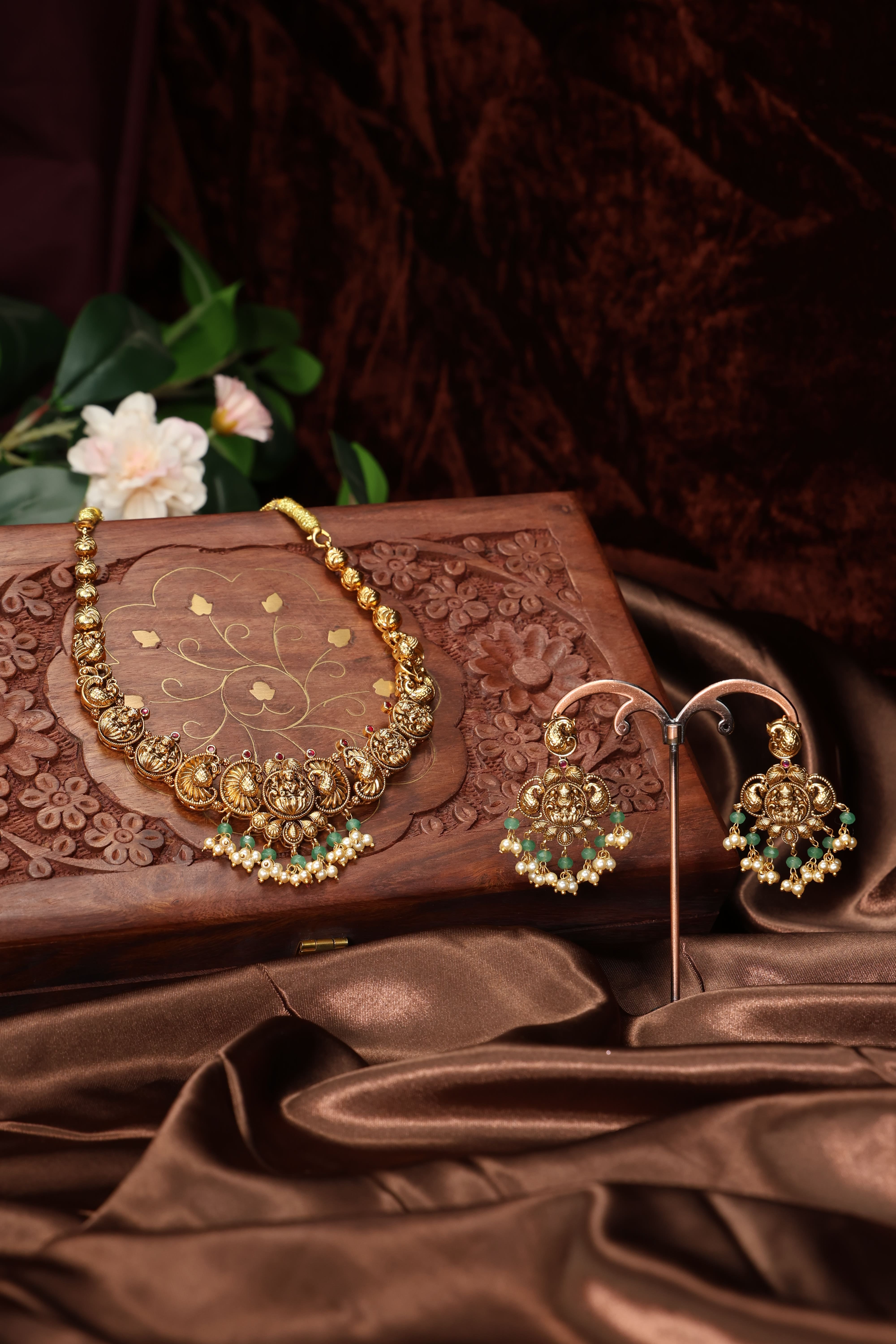 Antique neclace with lakshmi mottif along with rice pearls