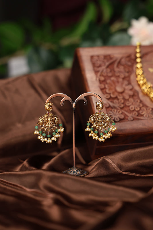 Antique neclace with lakshmi mottif along with rice pearls