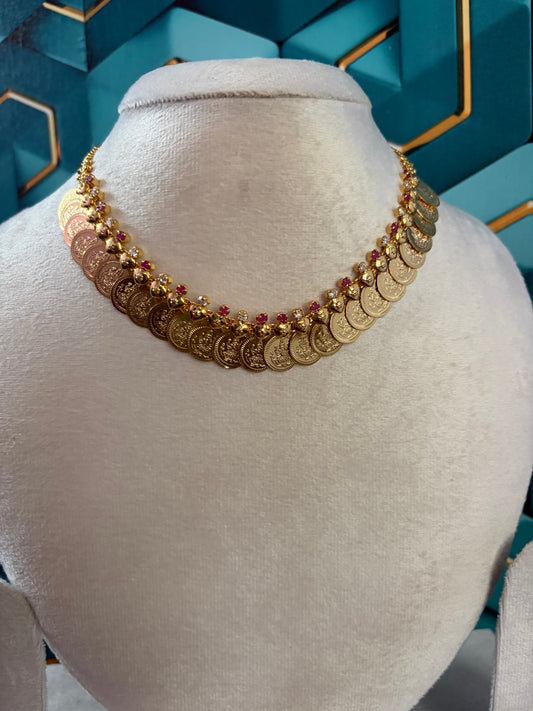 Impon coin necklace with ruby and white stone