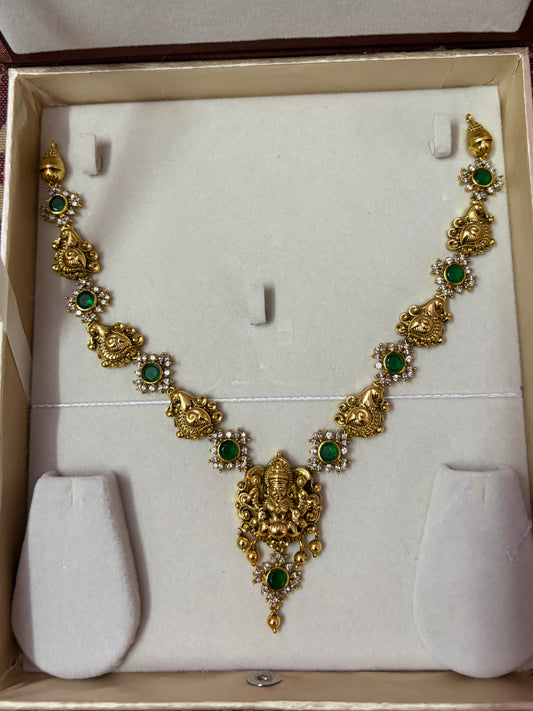 Nakshi Lakshmi with peacock and emerald stone necklace