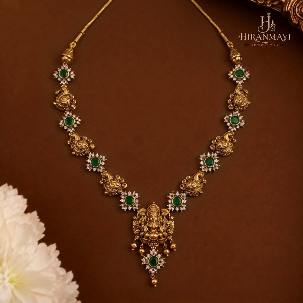 Nakshi Lakshmi with peacock and emerald stone necklace