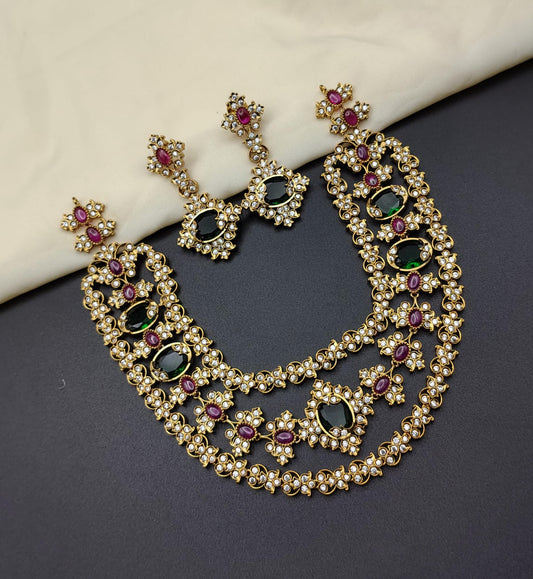 Three layer emerald green and ruby pink necklace with earrings